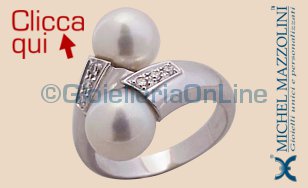 anello in oro bianco contrariè con due perle e diamanti